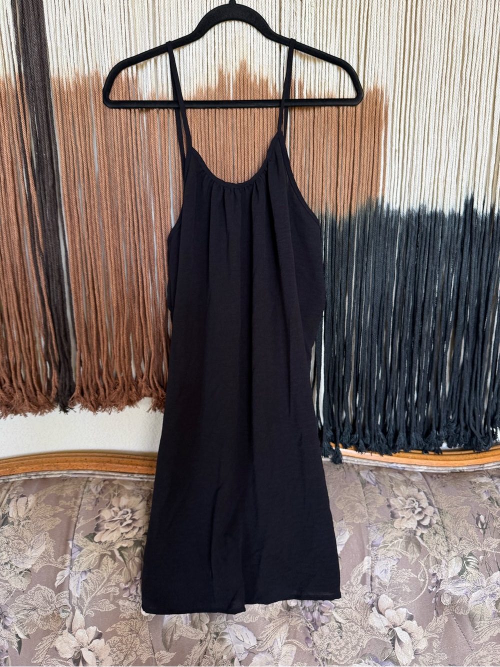 Black dress with open back and adjustable back for more or less coverage